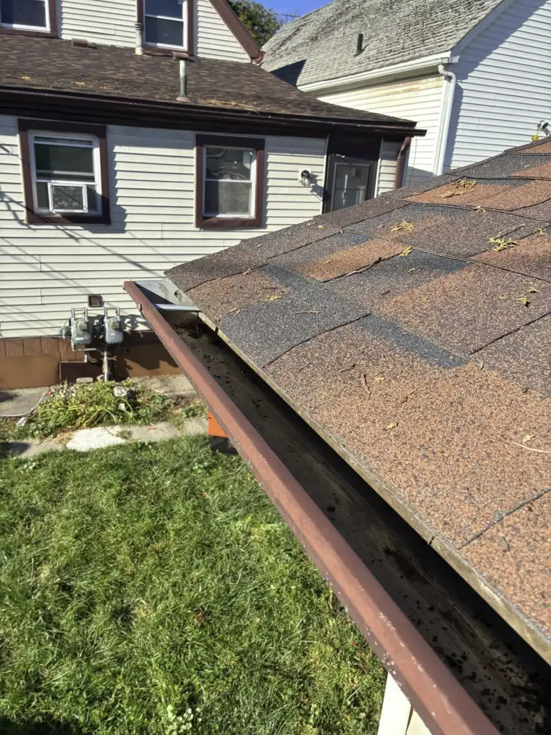 Clean empty gutter after professional cleanout Metro Detroit